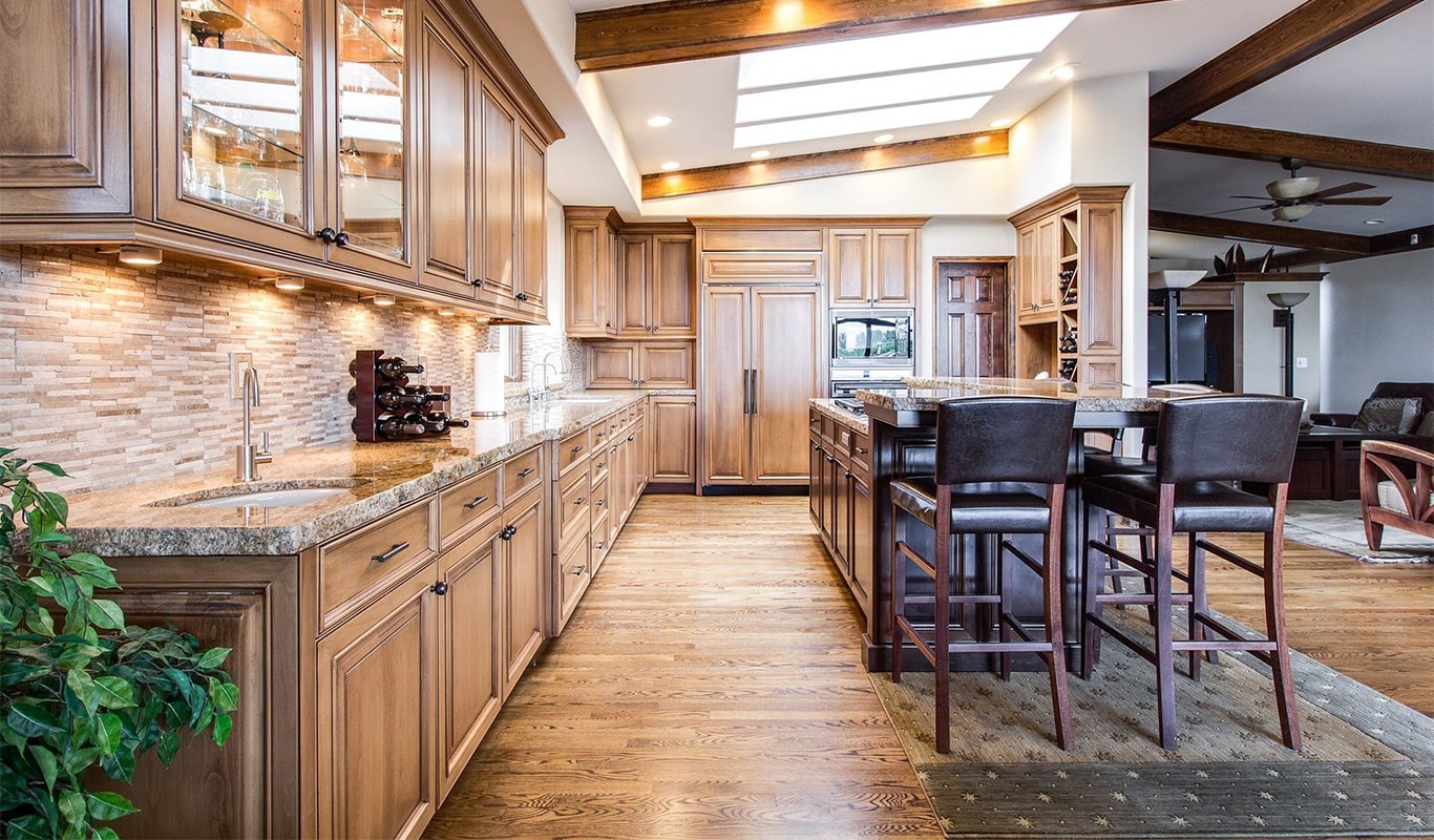 Image of a well designed kitchen space with a wooden finish 